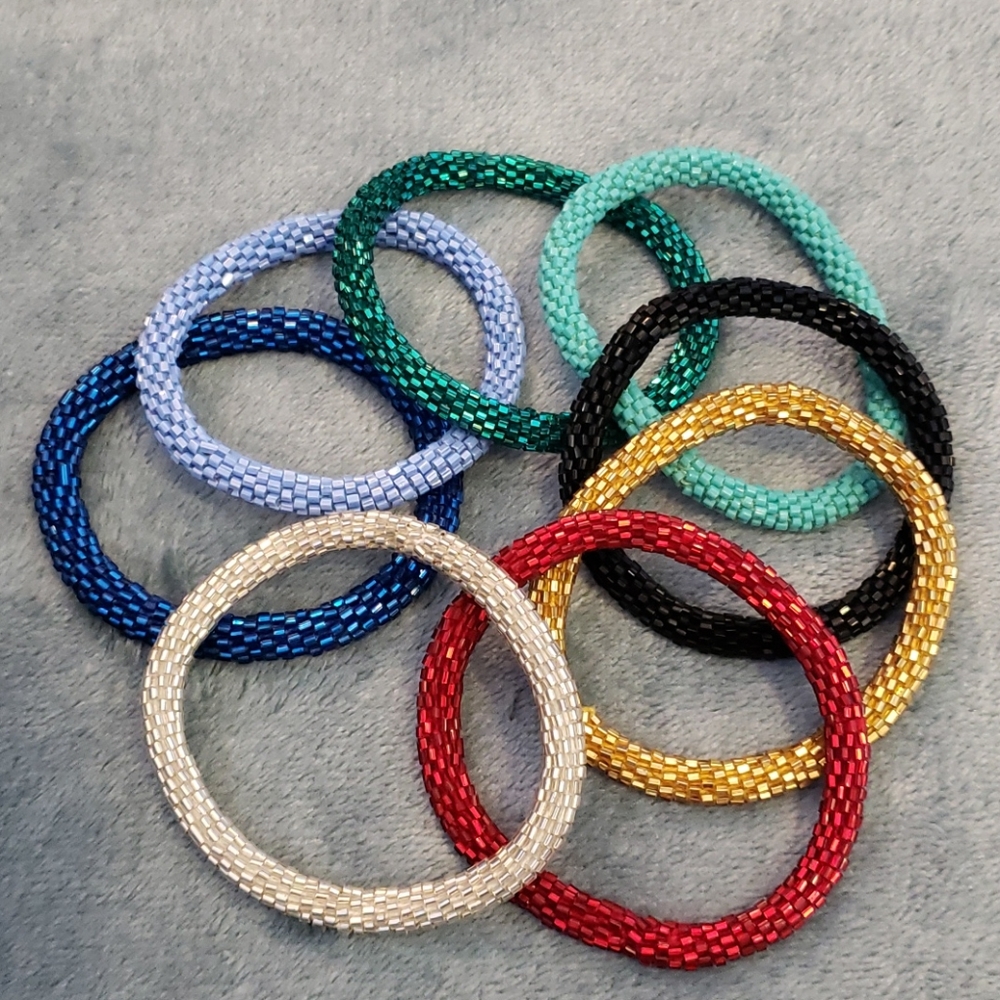 Bundle of 8 beaded bangle bracelets